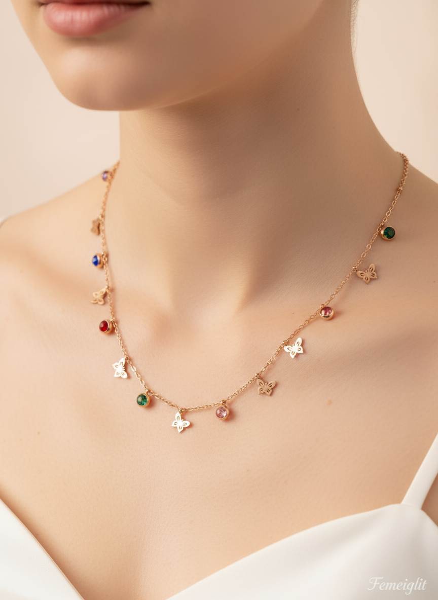 Necklace with colorful charms on a mannequin bust.