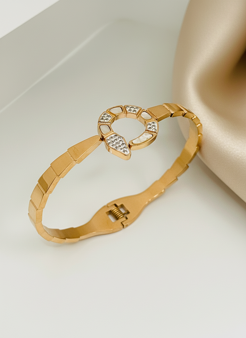 Rose Gold bracelet with a heart-shaped clasp on a light background