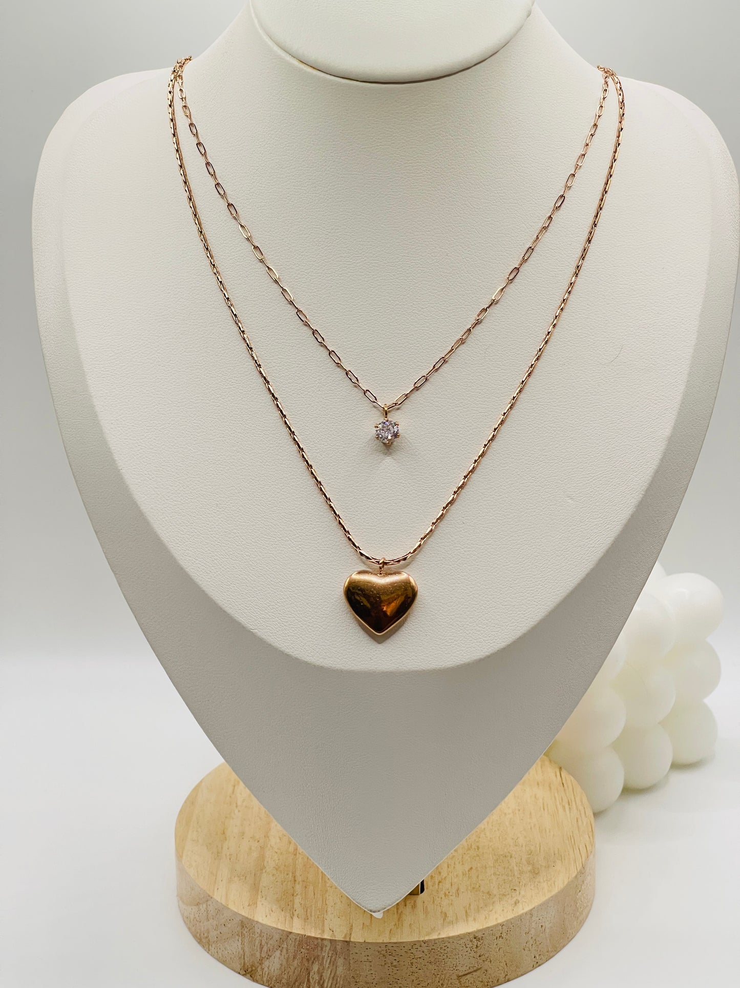 Necklace with heart pendant on a mannequin bust