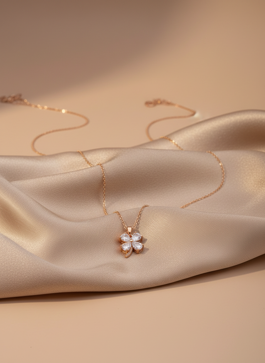 Necklace with a leaf-shaped pendant on a mannequin bust