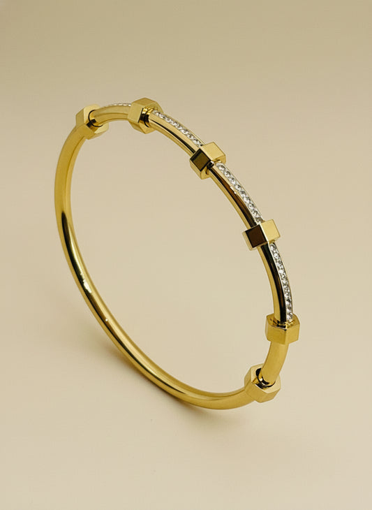 kids Gold bracelet with diamond accents on a white background