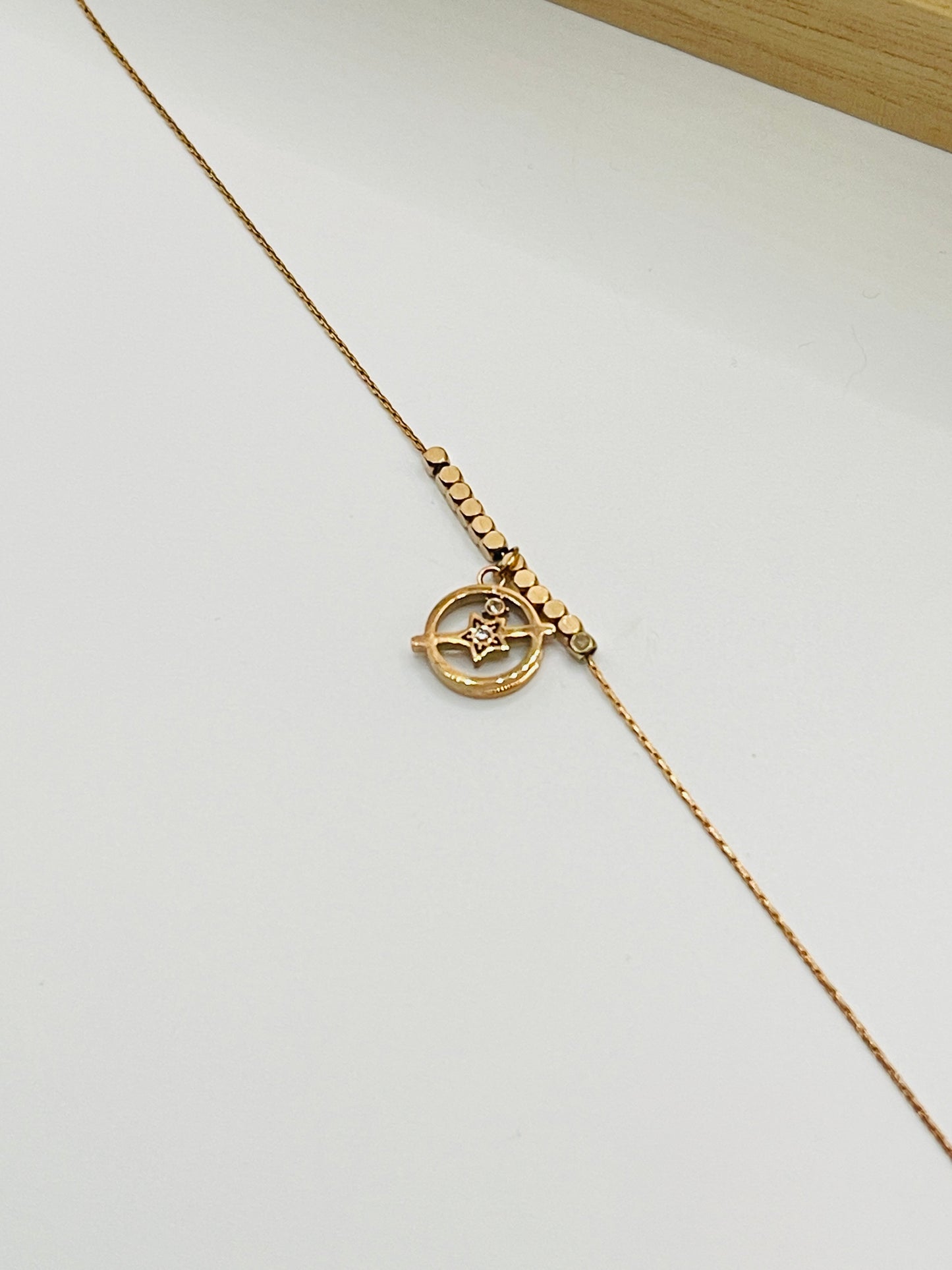 Rose Gold Star Orbit Charm Bracelet