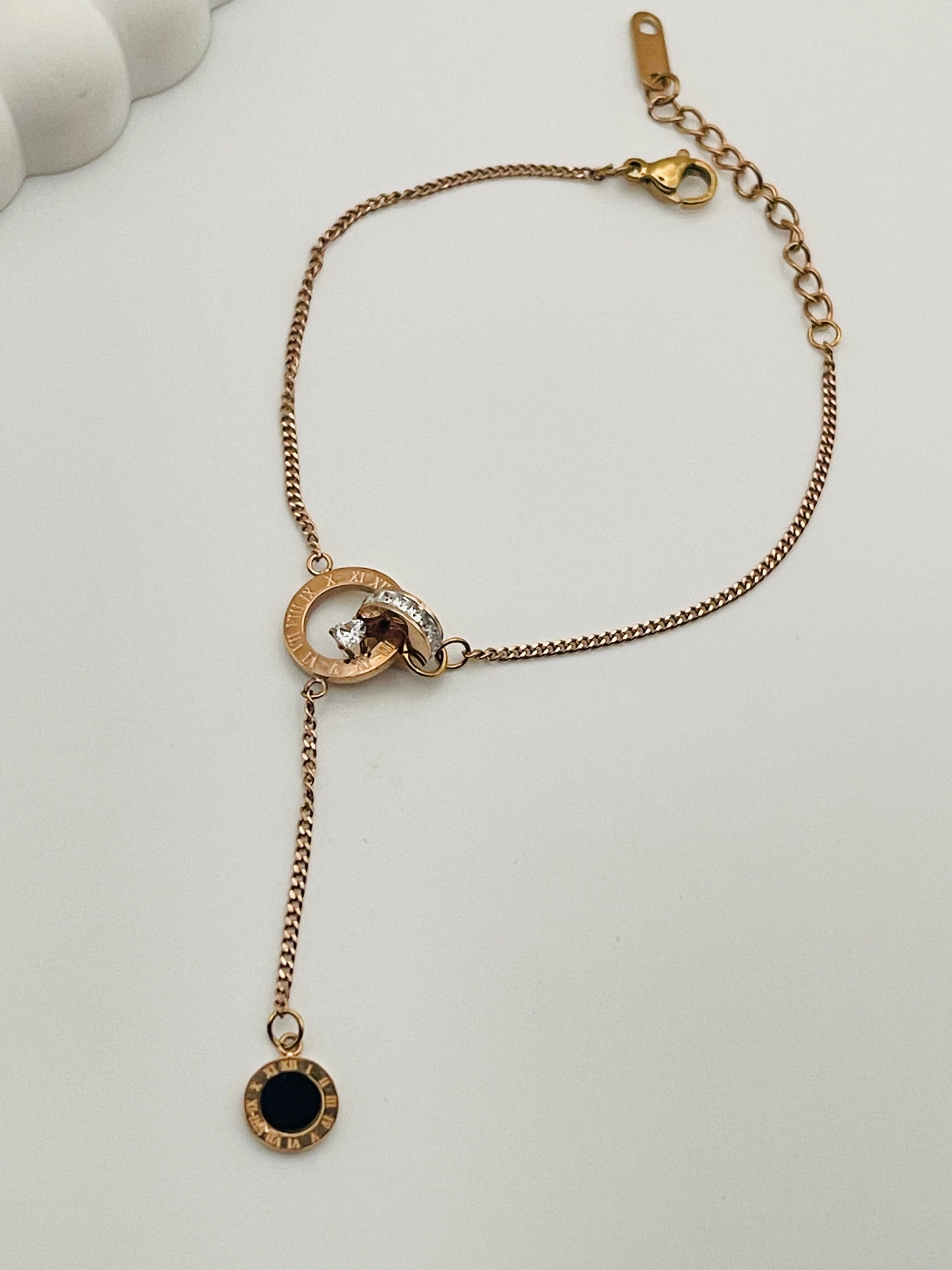 Rose Gold Interlocking Dangle Bracelet