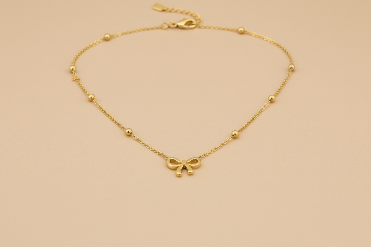 The Petite Bow Station Necklace