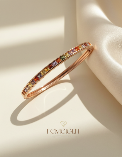Multicolored gemstone bracelet on a light background with 'Femeiglit' branding.