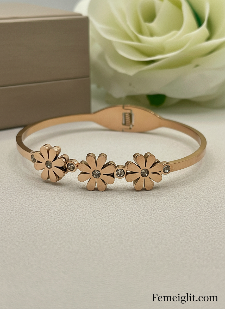 Rose Gold bracelet with floral designs on a white background