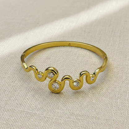 Wave Crystal Accent Gold Bangle