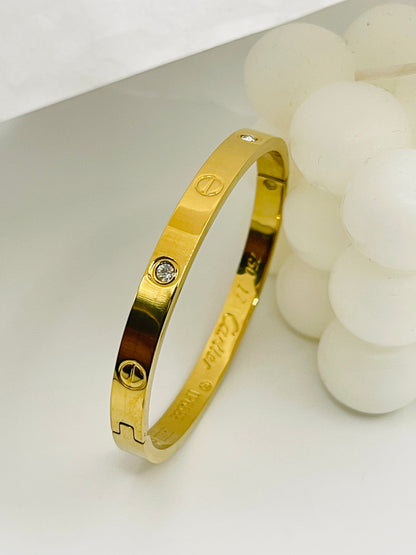 Diamond-Accented Gold Love Bangle