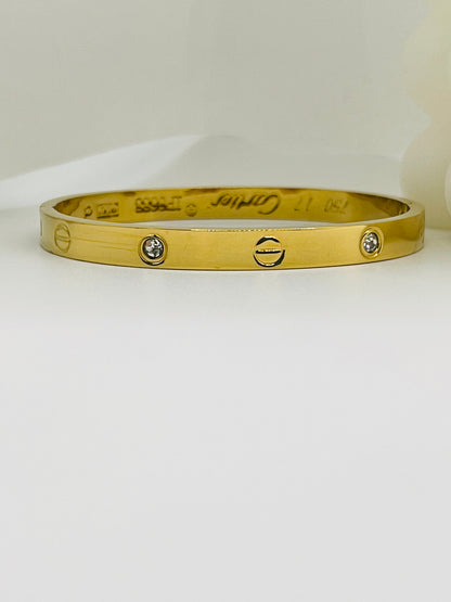 Diamond-Accented Gold Love Bangle