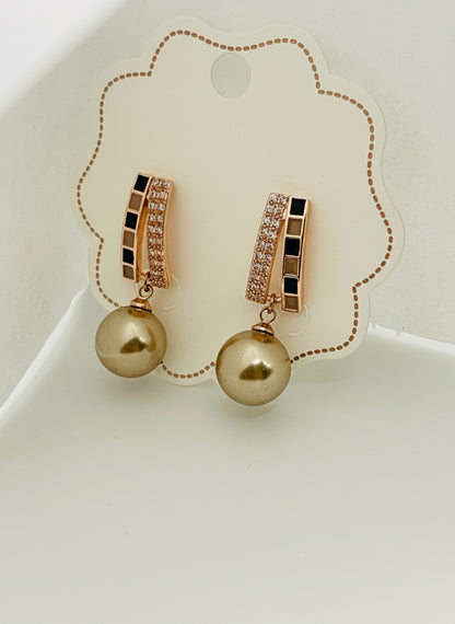 Rose Gold earrings with black accents o