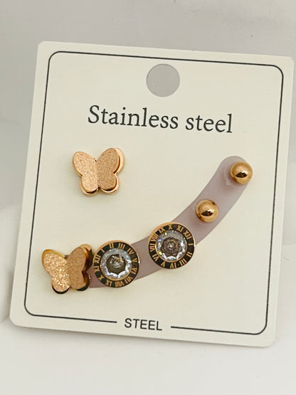 Set of butterfly-themed earrings on a branded card with 'Stainless steel' text.