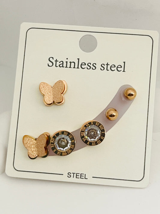 Set of butterfly-themed earrings on a branded card with 'Stainless steel' text.