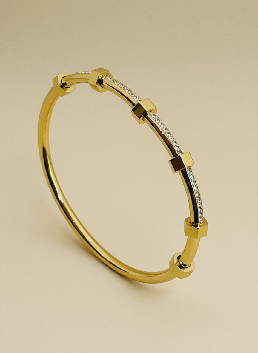 kids Gold bracelet with diamond accents on a white background