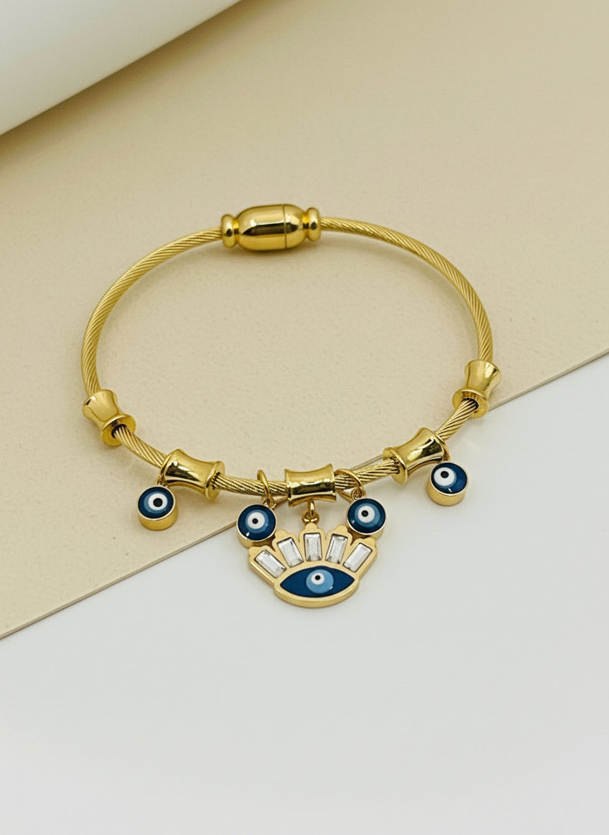 Kids Gold bracelet with eye-shaped charms on a white background