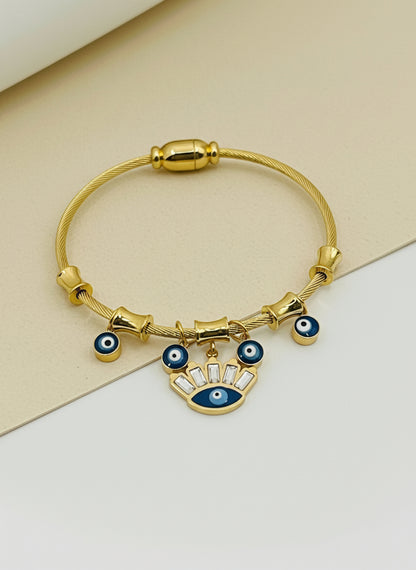 Kids Gold bracelet with eye-shaped charms on a white background
