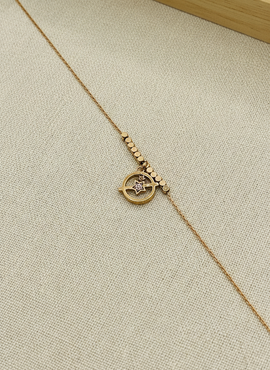 Rose Gold Star Orbit Charm Bracelet