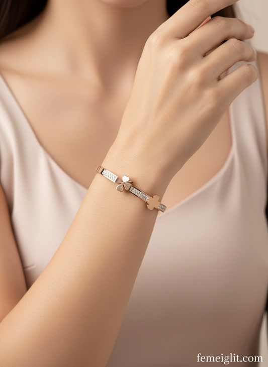 Close-up of a person wearing a bracelet with 'femeight' branding.