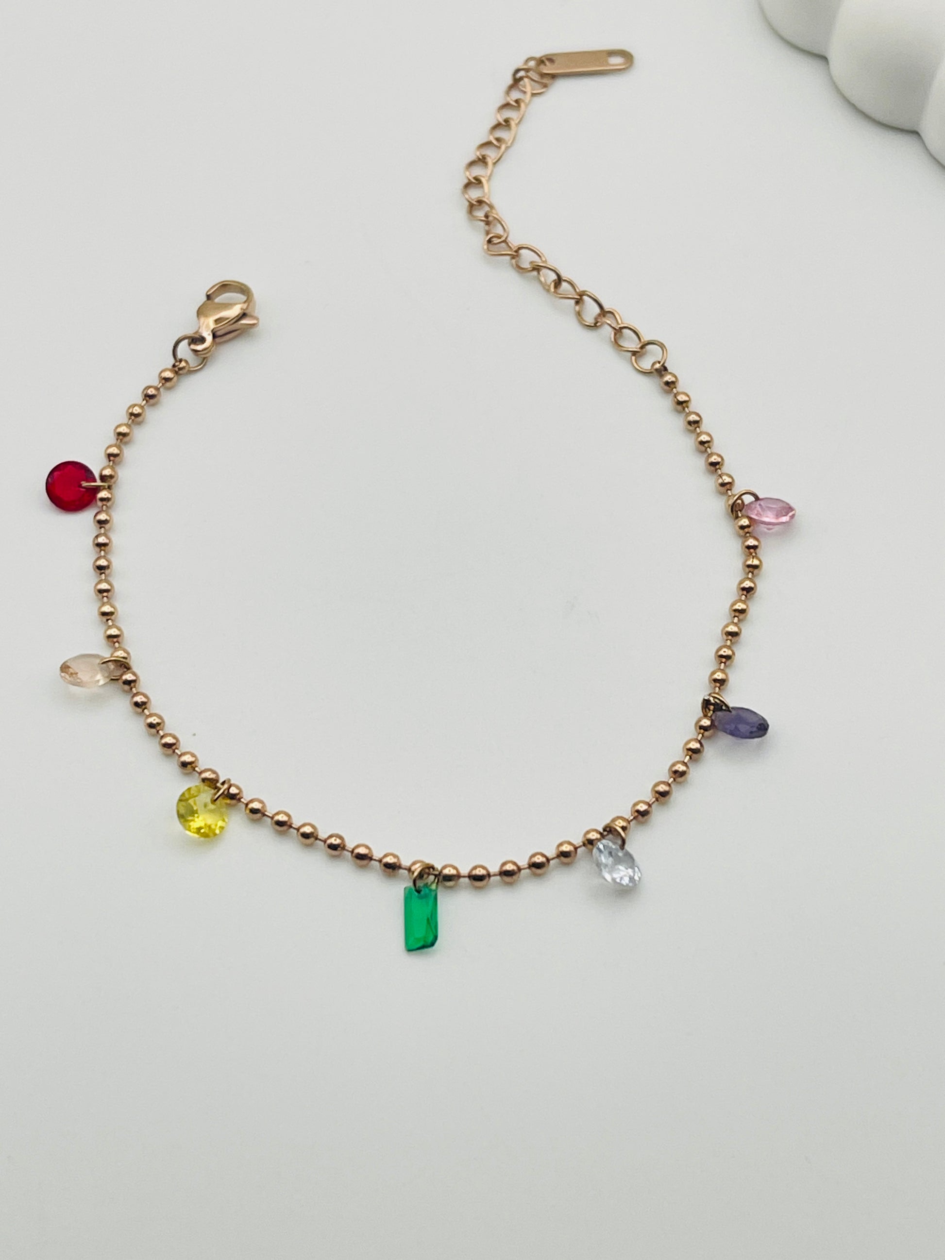 Bracelet with colorful beads on a white background