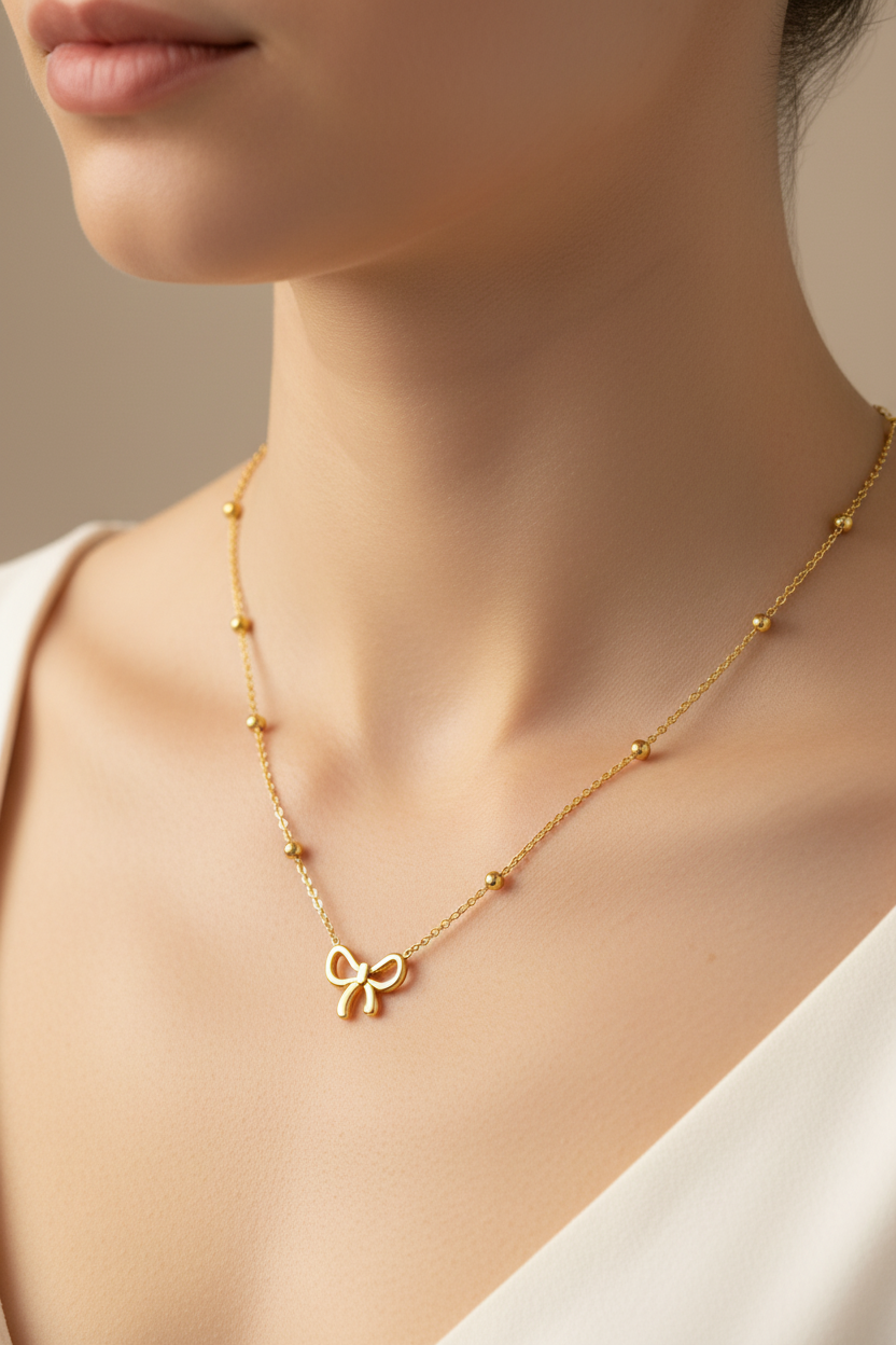 The Petite Bow Station Necklace