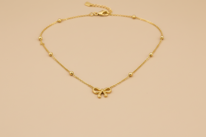 The Petite Bow Station Necklace