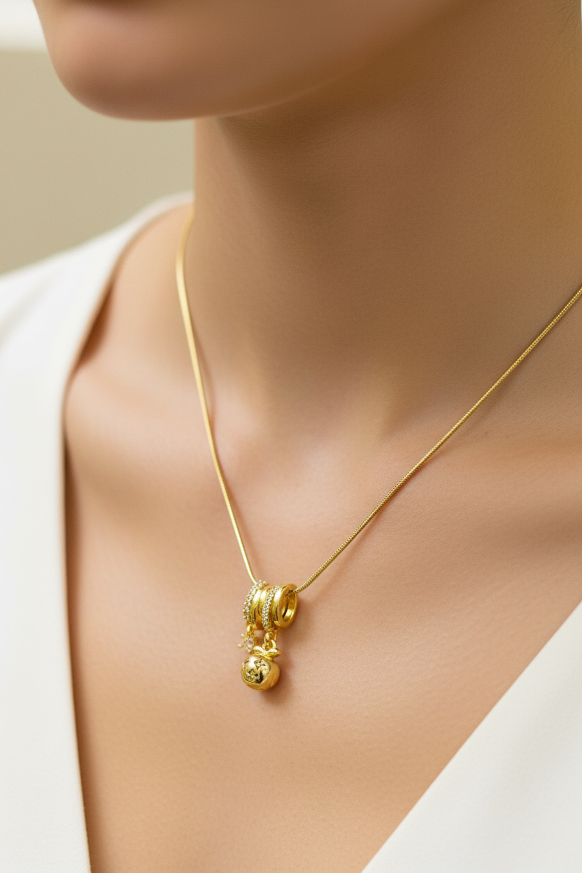 Trilogy Sparkle: Triple-Ring & Apple Pendant Chain