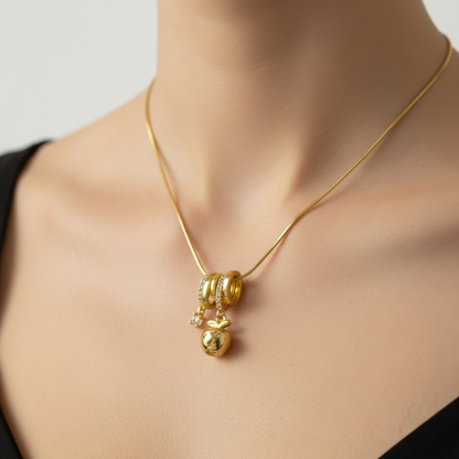 Trilogy Sparkle: Triple-Ring & Apple Pendant Chain