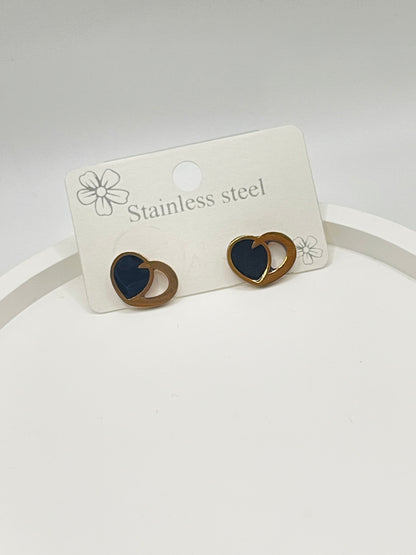 Heart-shaped rose earrings on a white card with 'Stainless steel' text against a light gray background
