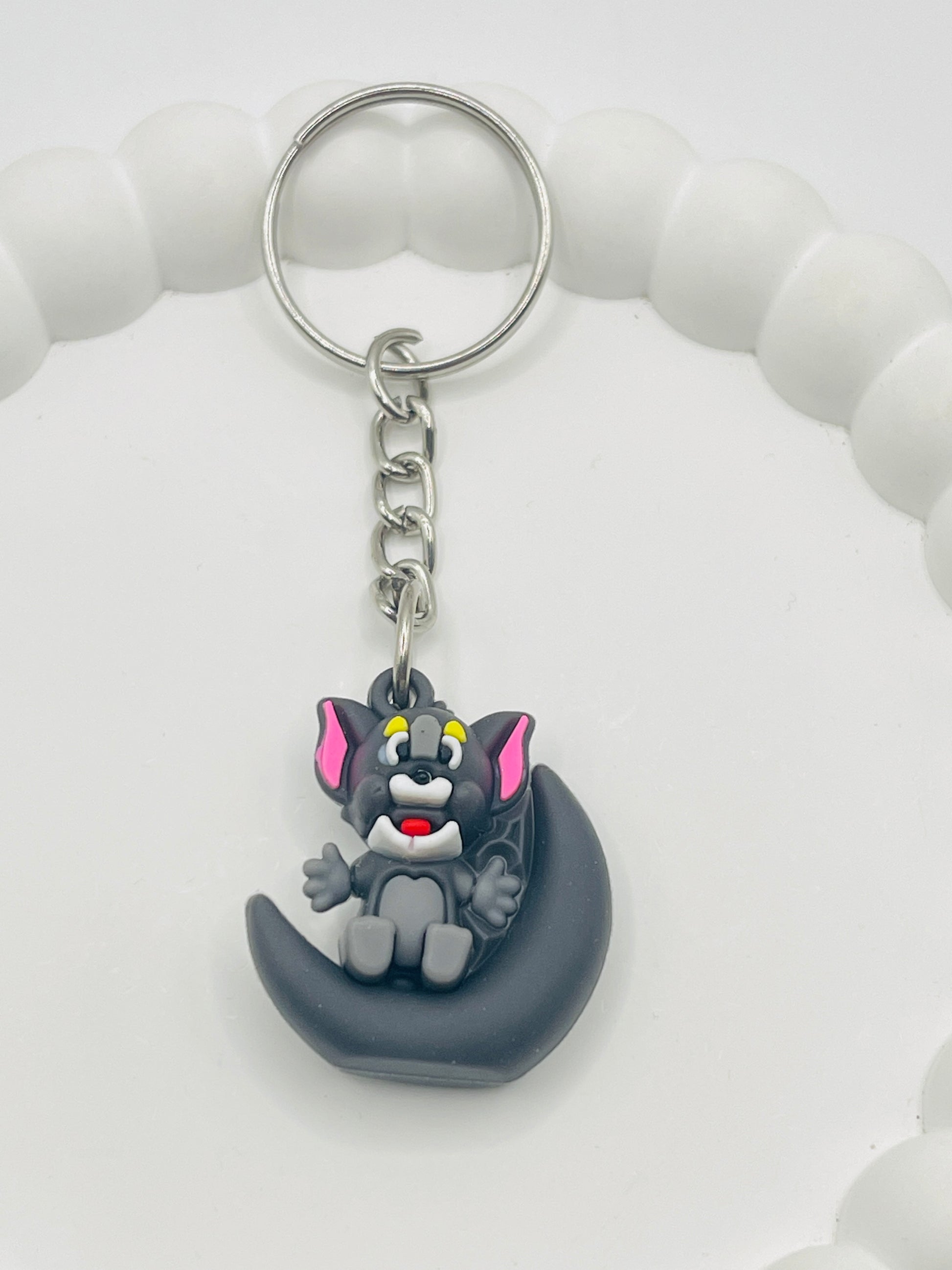 Keychain with cartoon character on a white background
