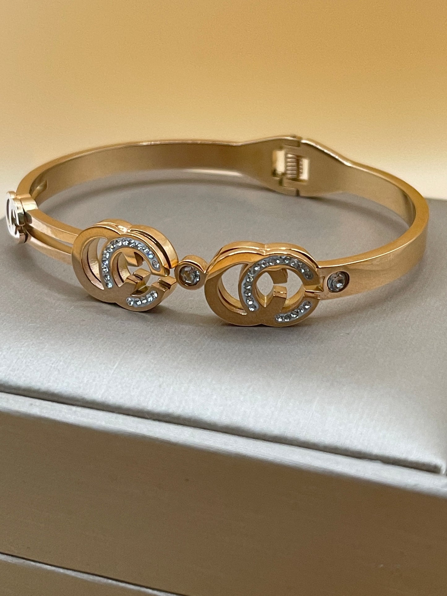 Interlocking Crystal Logo Rose Gold Bangle