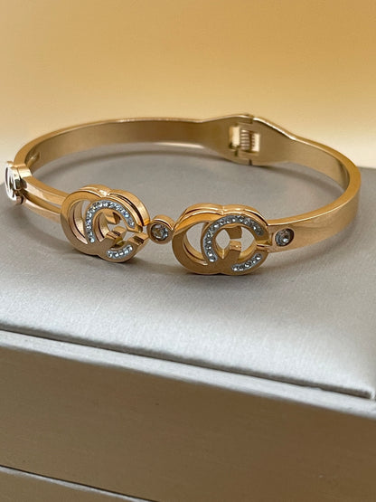 Interlocking Crystal Logo Rose Gold Bangle