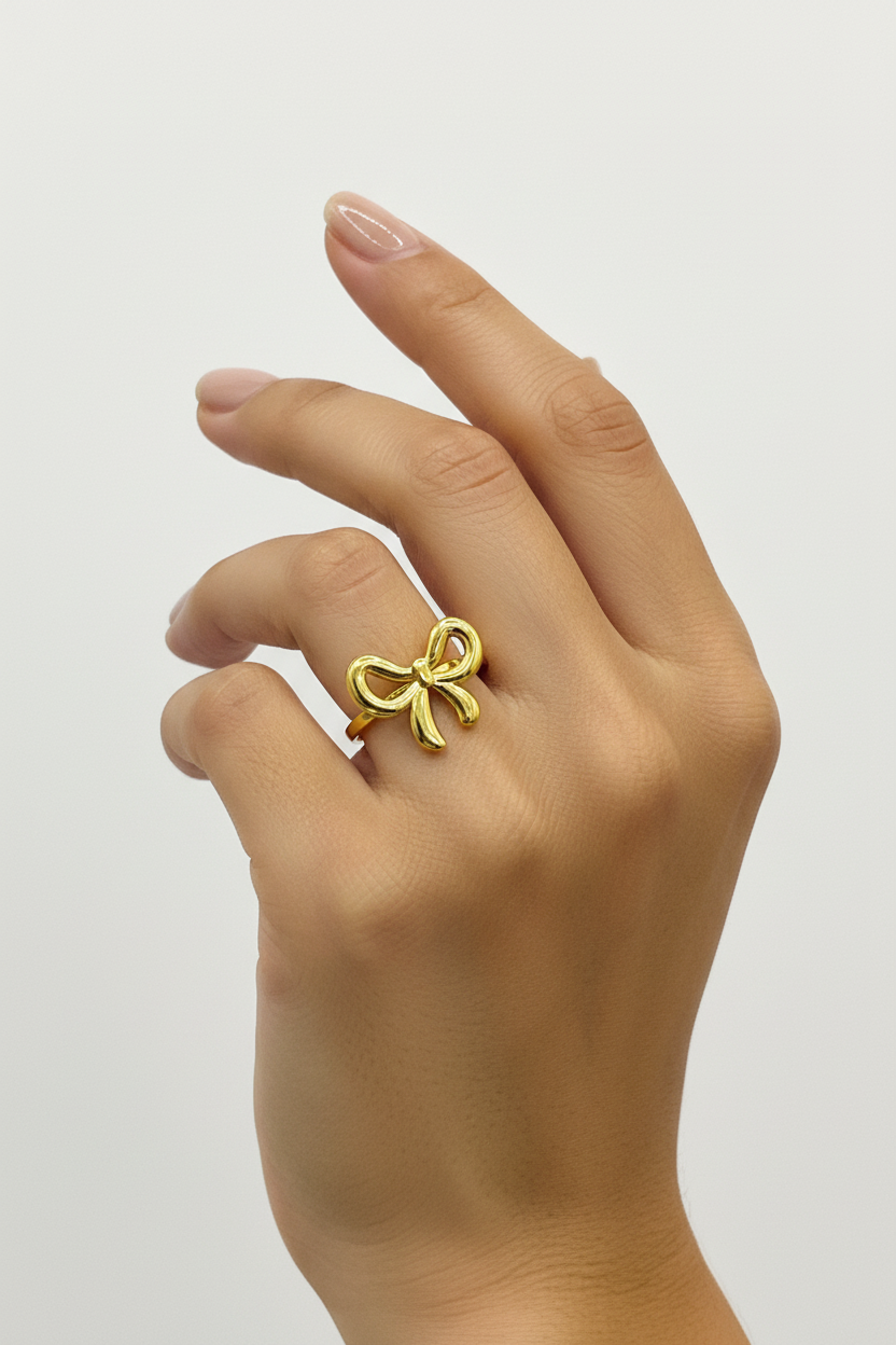 Gold Bow Ring on Model Hand - Delicate Size